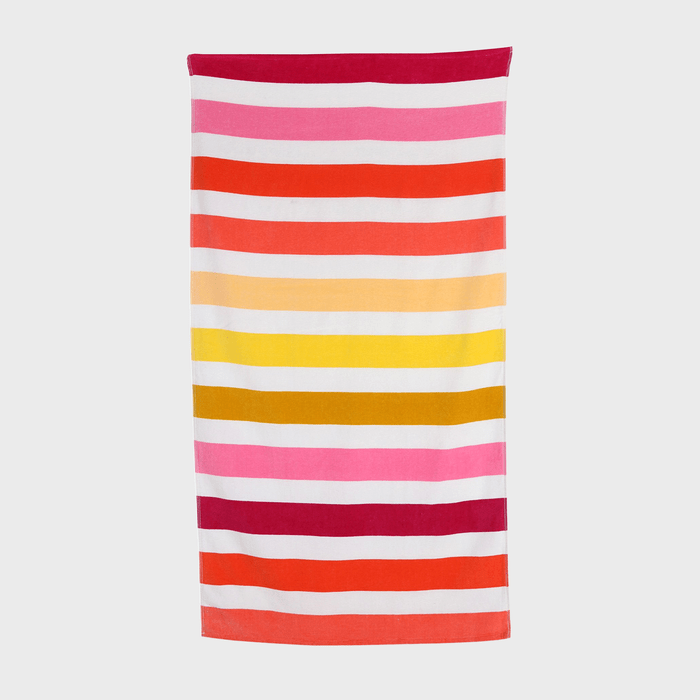 A towel displays horizontal stripes in pink, red, orange, yellow, and white against a plain background.