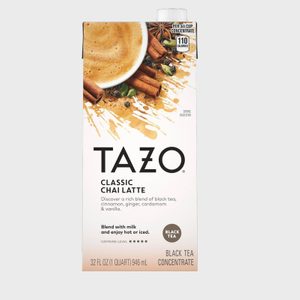 Carton shows Tazo Classic Chai Latte with a cup of chai, cinnamon, cardamom, and text about blending with milk for a hot or iced drink.