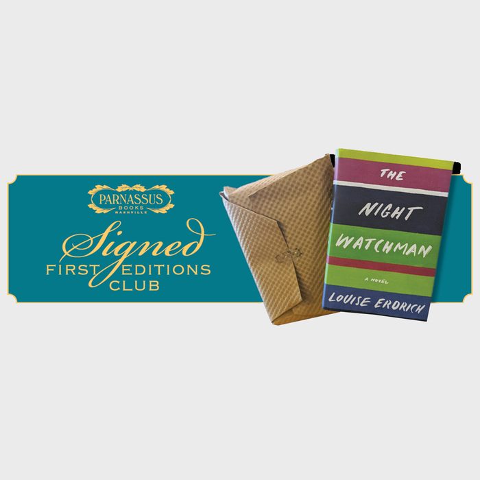 Book rests beside a package on a teal banner displaying 