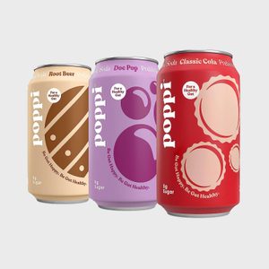 Three colorful soda cans, labeled 