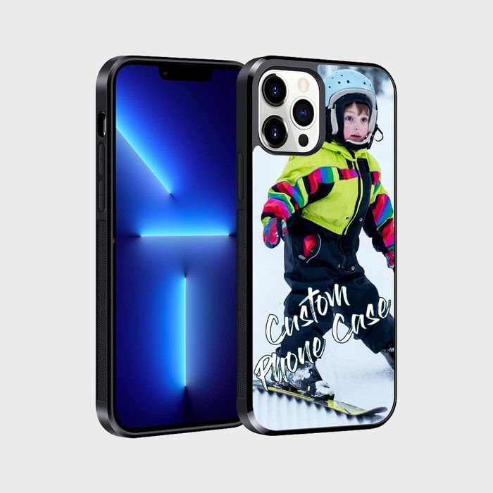 Phone case features a child skiing in a colorful outfit, text reads 