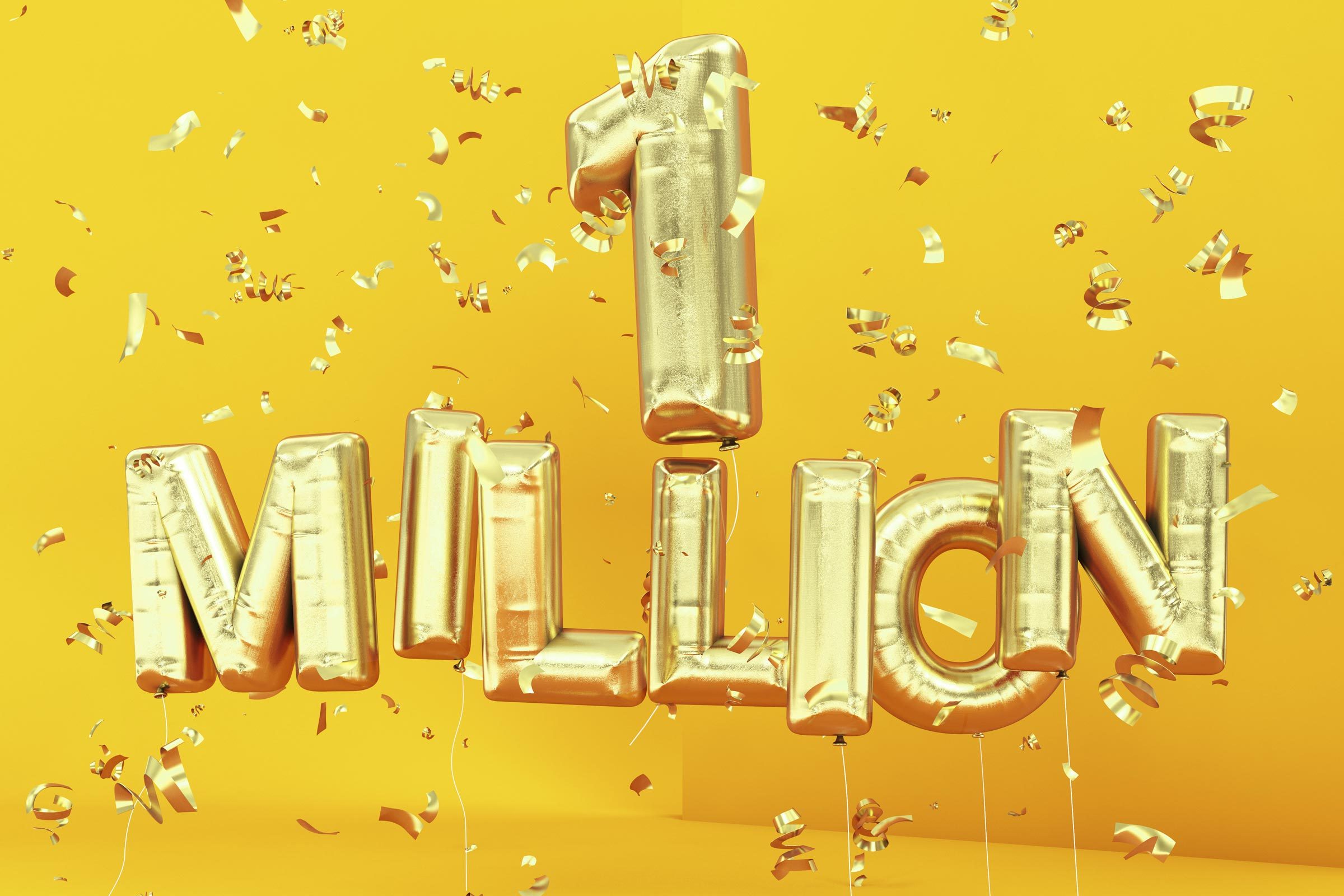 Golden balloon letters spell "1 MILLION," floating amidst golden confetti in a bright yellow background.