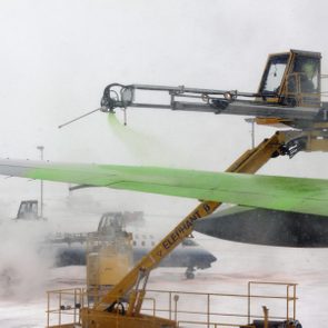 Green Fluid On An Airplane Wing