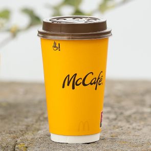 A cup with the McCafe logo is seen.