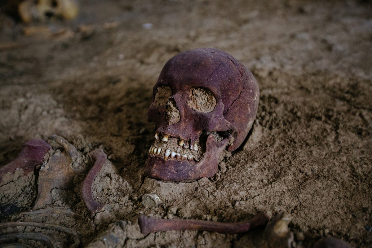 human skeleton in tomb at archeological excavation