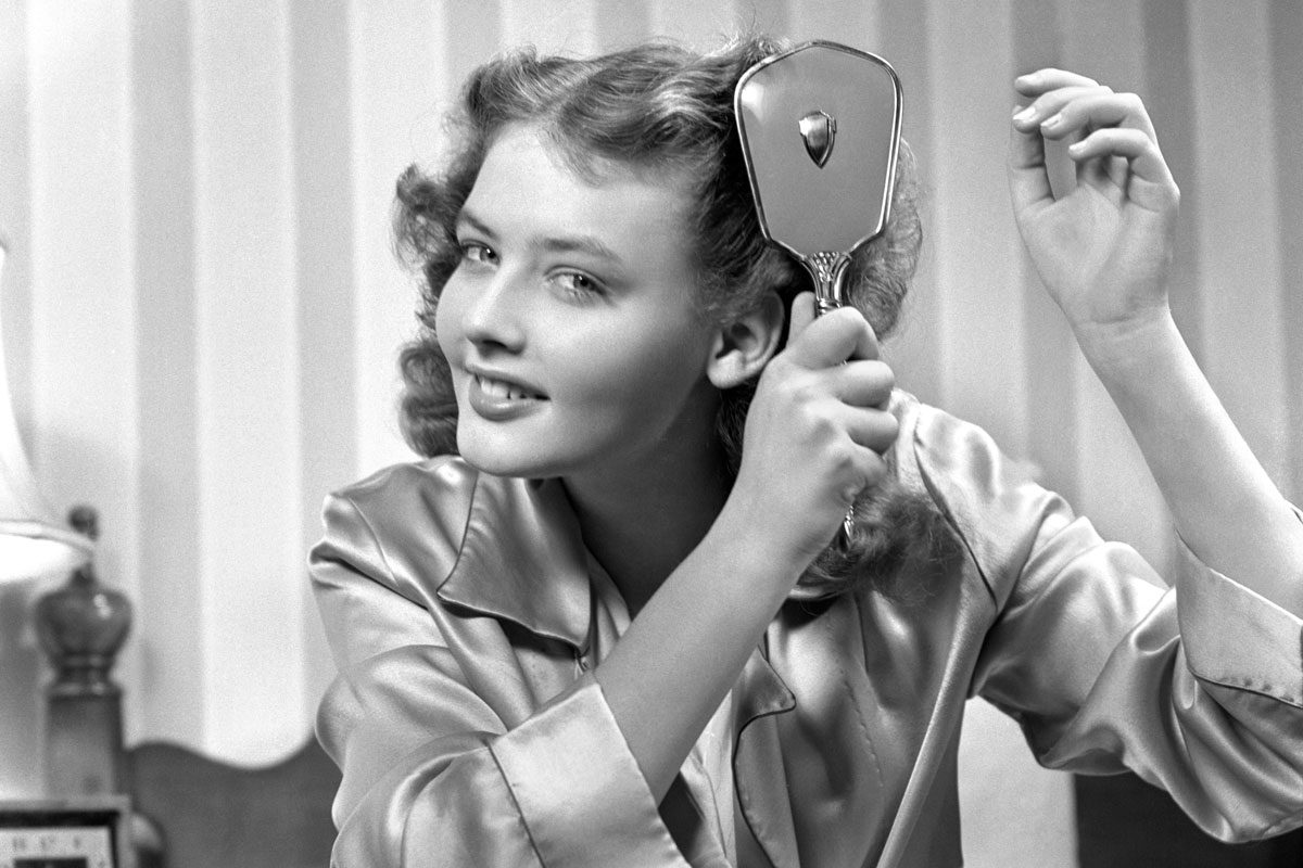 girl brushing her hair