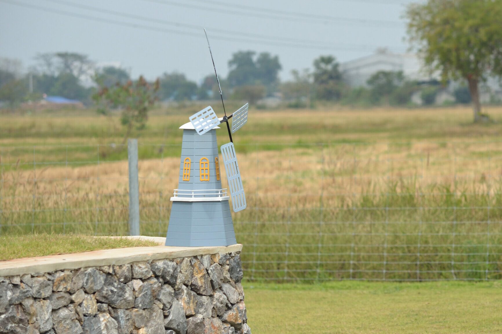 Decorative small blue windmill