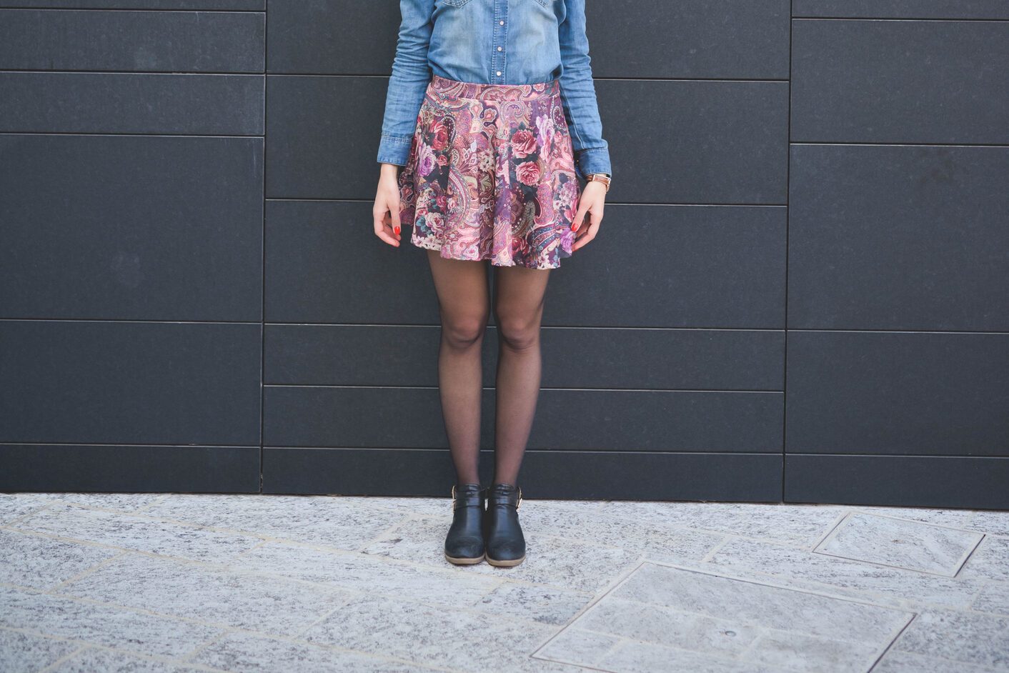Young beautiful caucasian blonde girl in the city