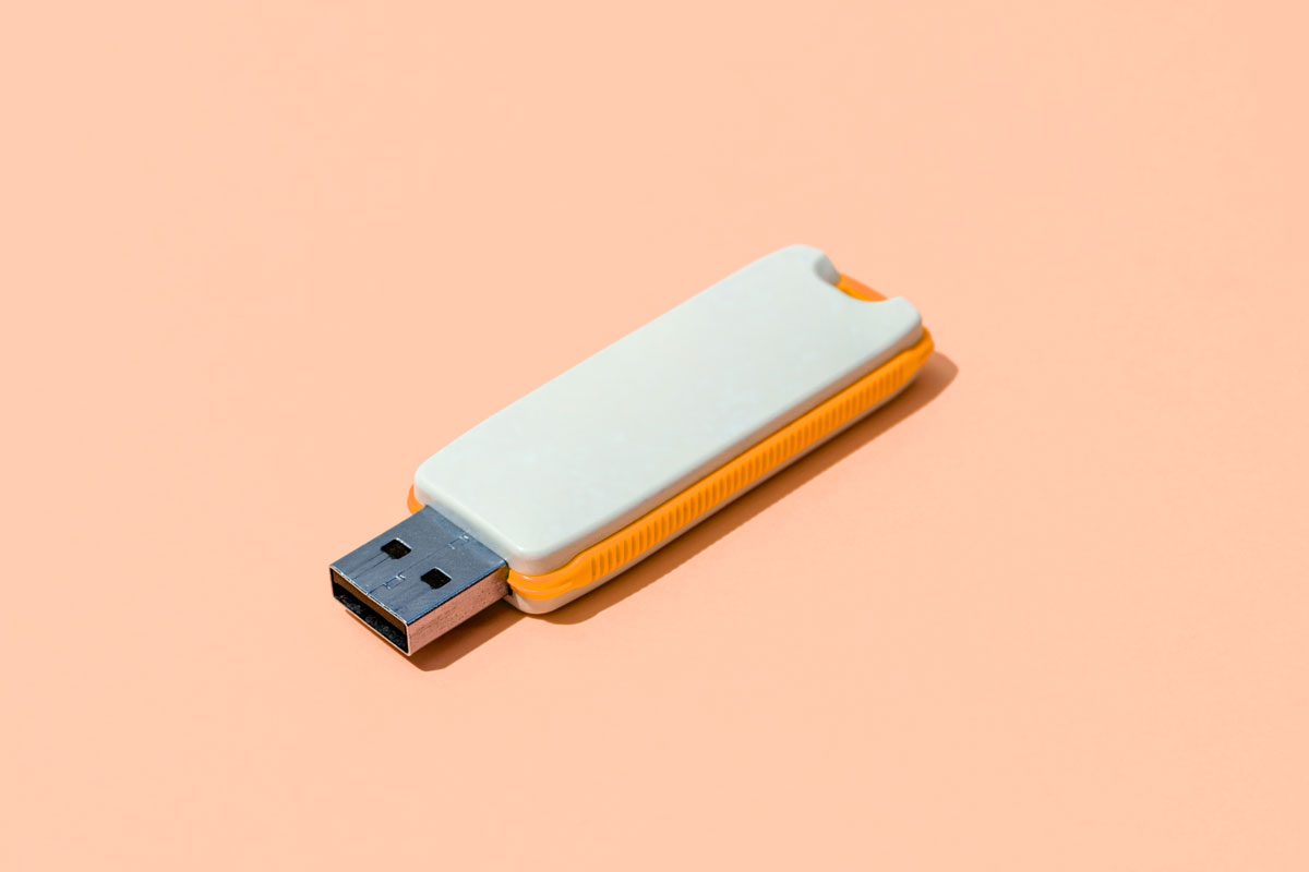 Usb Pen Drive On Orange Background