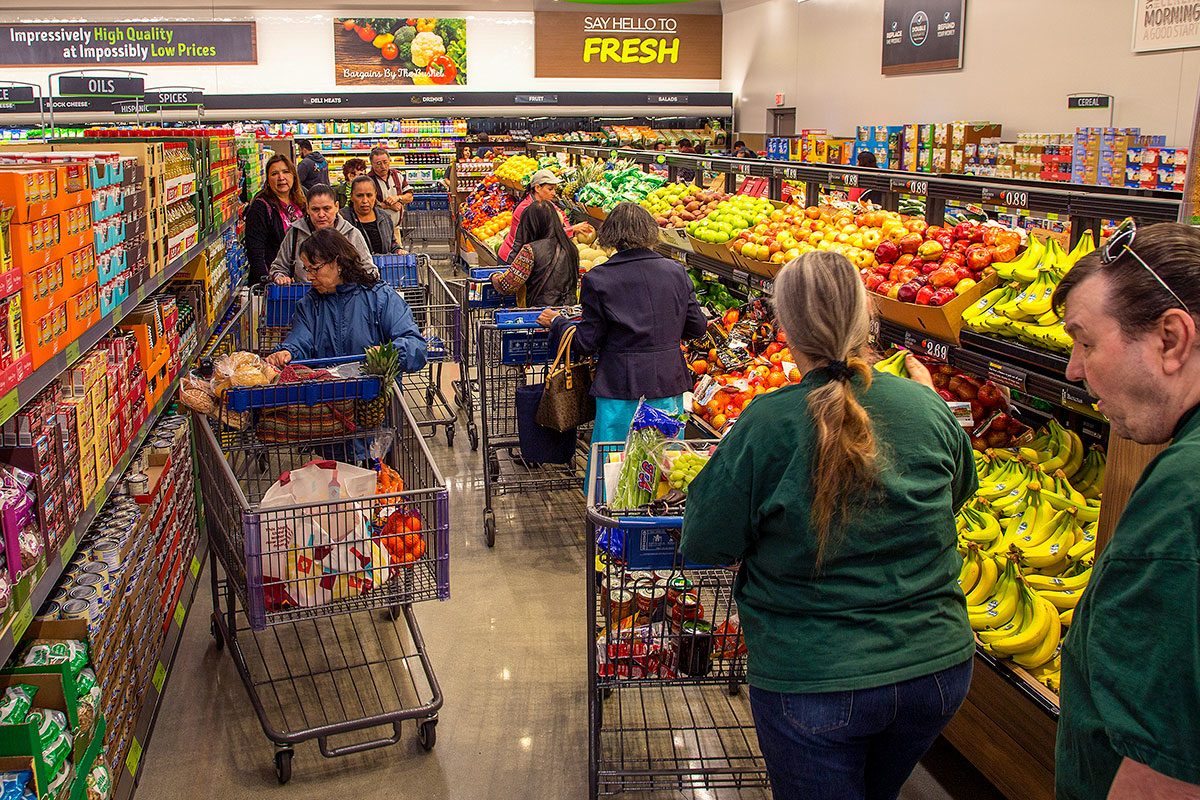 The aisles are crowded at Aldi food market during the grand opening
