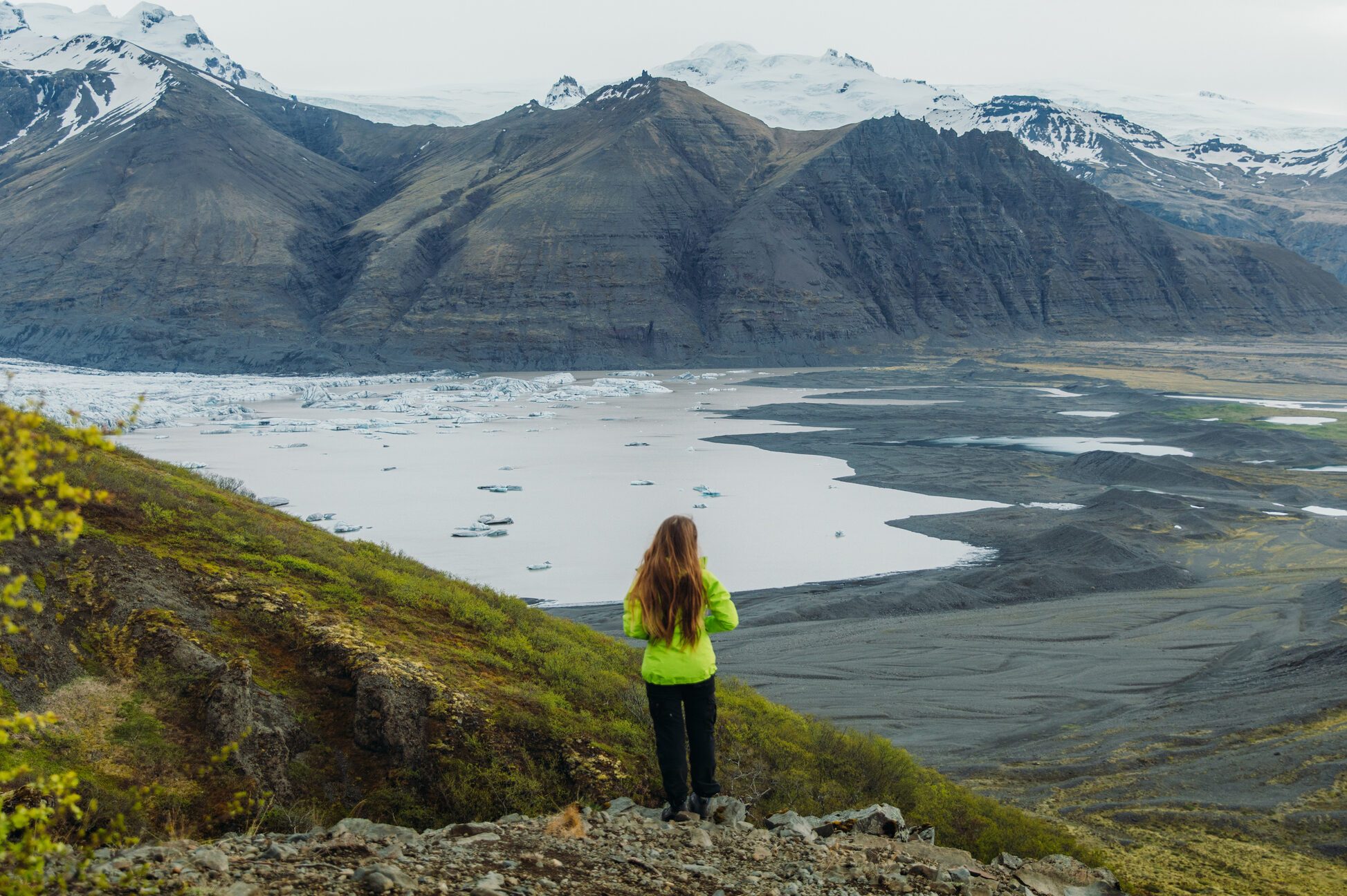 Woman traveler enjoying the best time outdoors in Iceland
