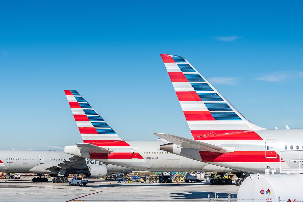 America Airlines planes waiting for passengers at Miami International Airport.