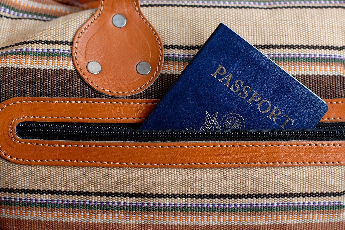 American passport slid into a travel bag