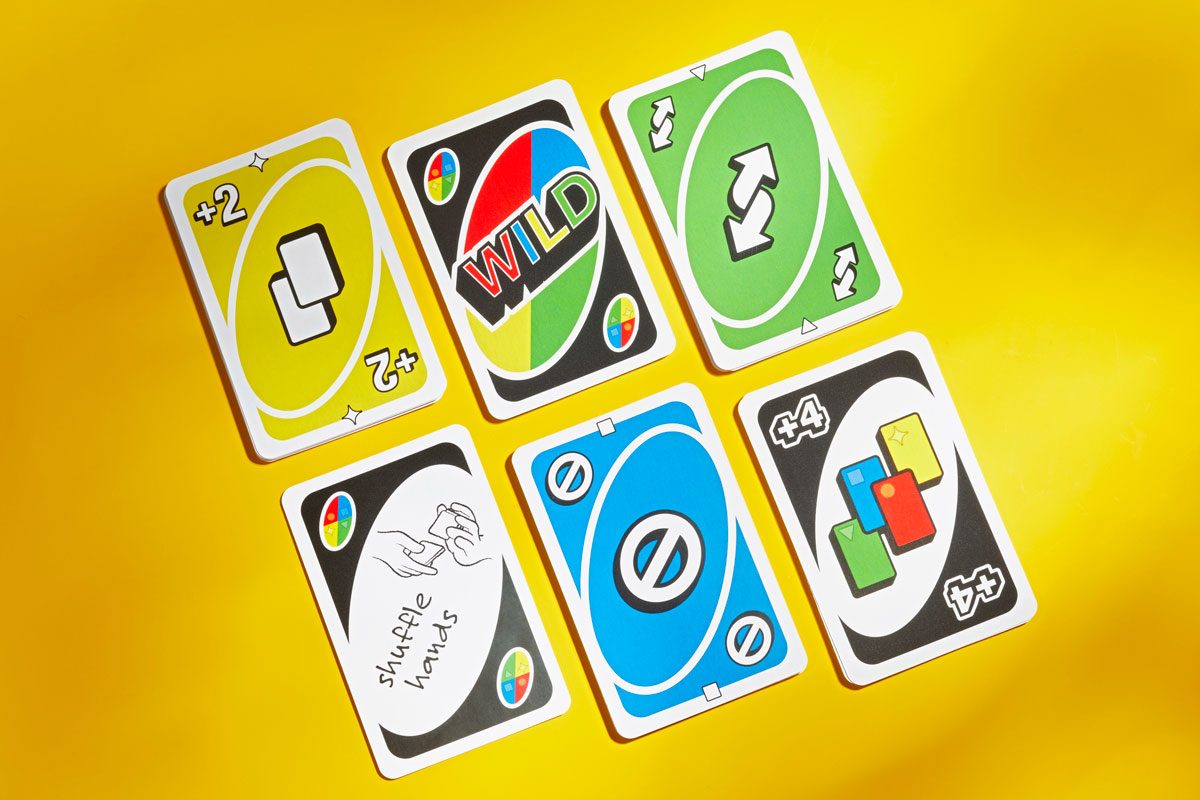 Uno special action cards arranged on yellow background
