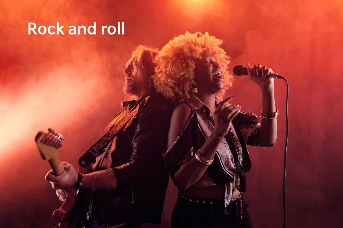 Rock And Roll Music Band On Stage In Nightclub
