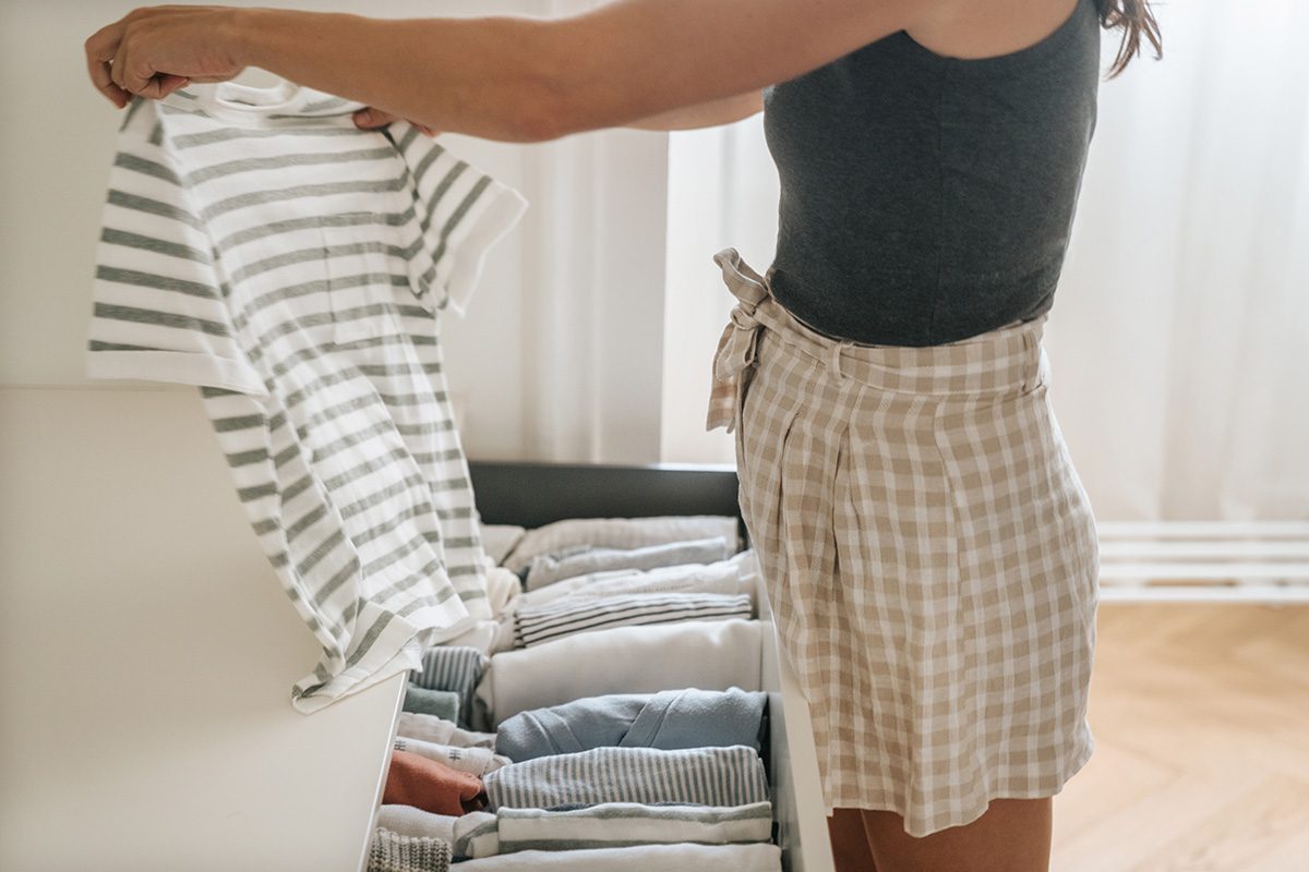 Woman folding clothes