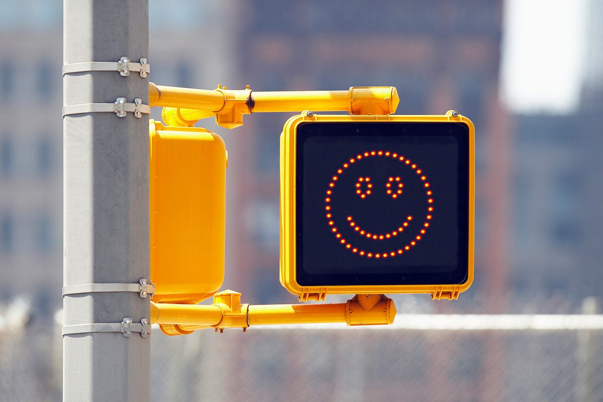 Traffic sign with smiley face