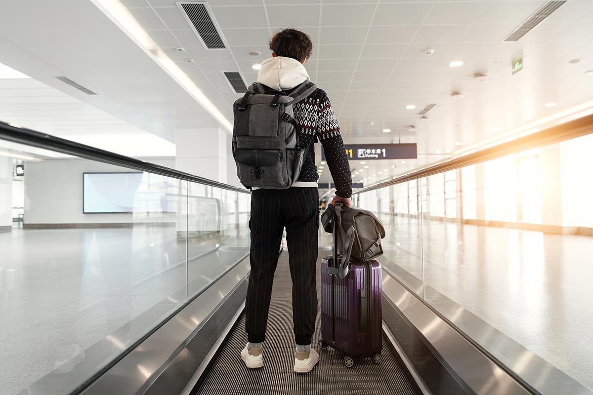 Passenger walking in the airport terminal