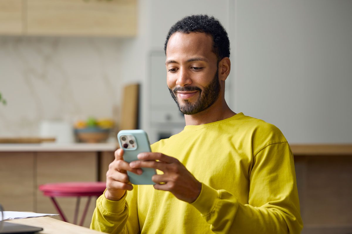 Young Man Using Smart Phone
